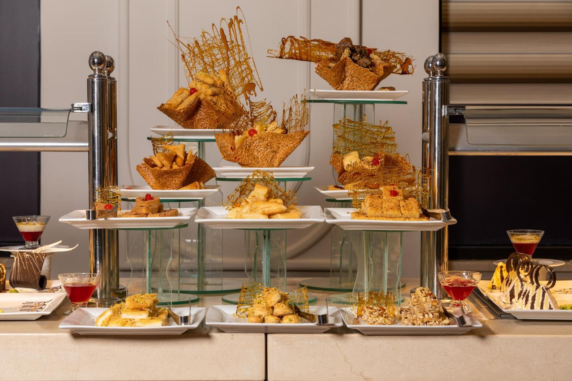 Pickalbatros Laguna Club Resort Sharm El Sheikh Bagian luar foto A display of canapés